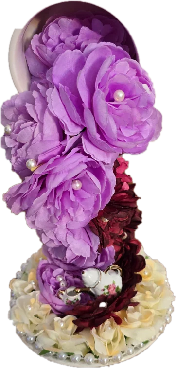 Floating teacup spilling lavender peonies onto a pearl-trimmed saucer